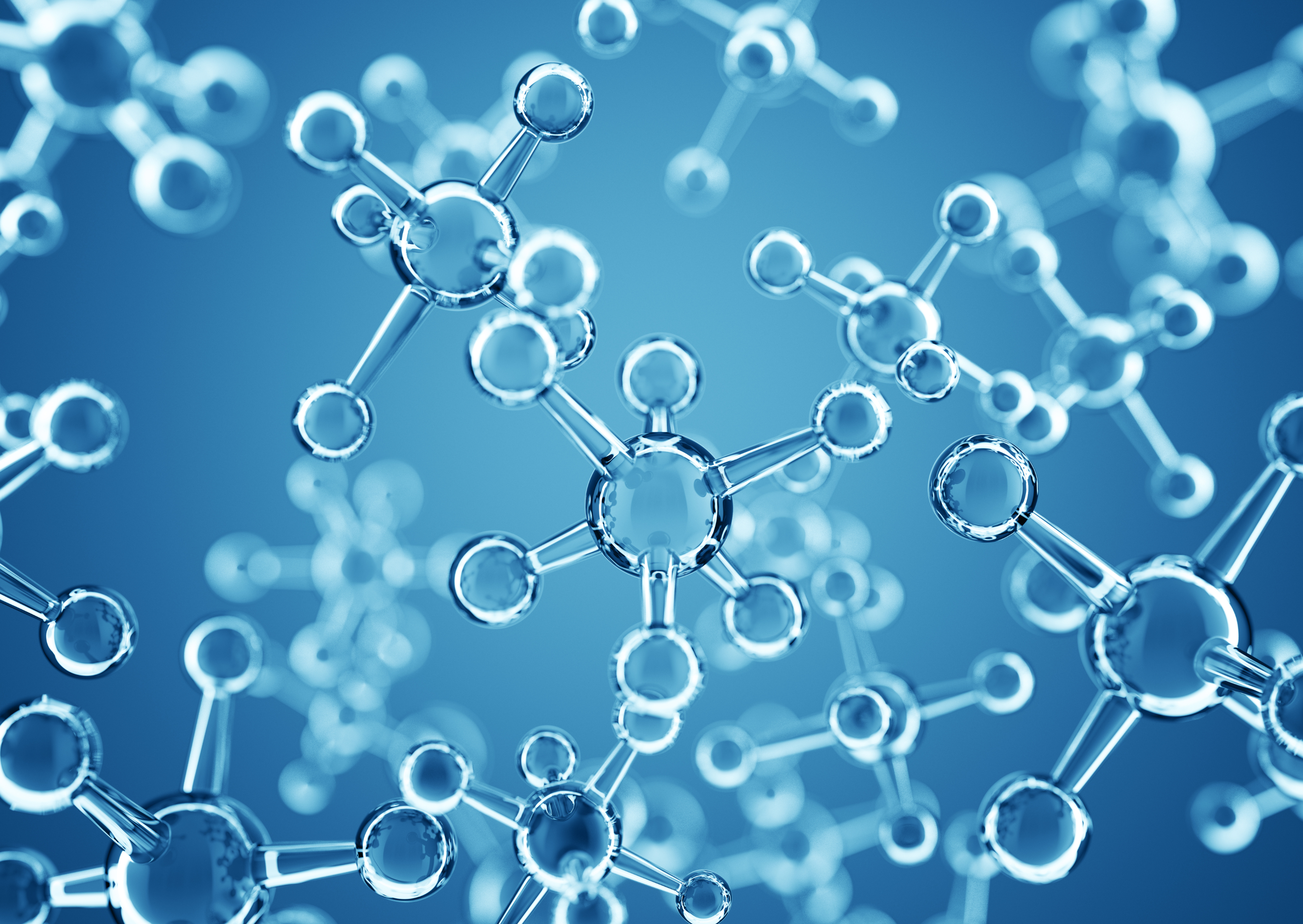 Vue microscopique de molécules transparentes sur un fond bleu